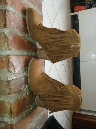 Texani estivi scamosciati con le frange