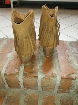 Texani estivi scamosciati con le frange