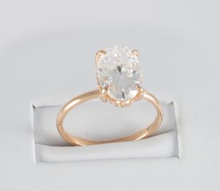 Anillo de compromiso halo oculto oro rosa 14k
