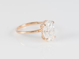 Anillo de compromiso halo oculto oro rosa 14k