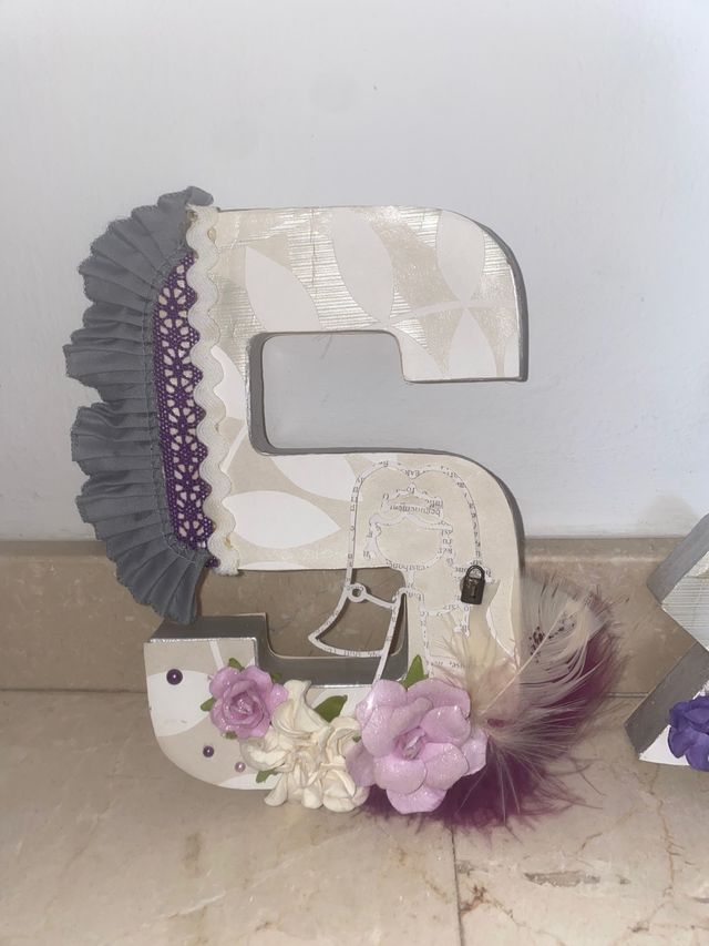 Letras iniciales S & M