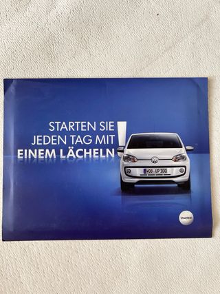 Postal Volkswagen UP retroiluminada