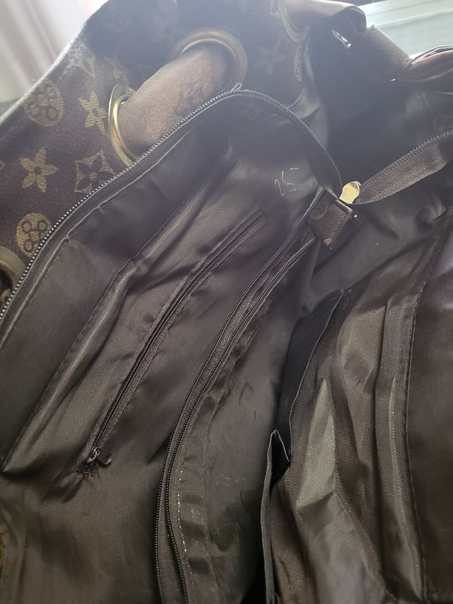 Borsa marrone e oro con simboli