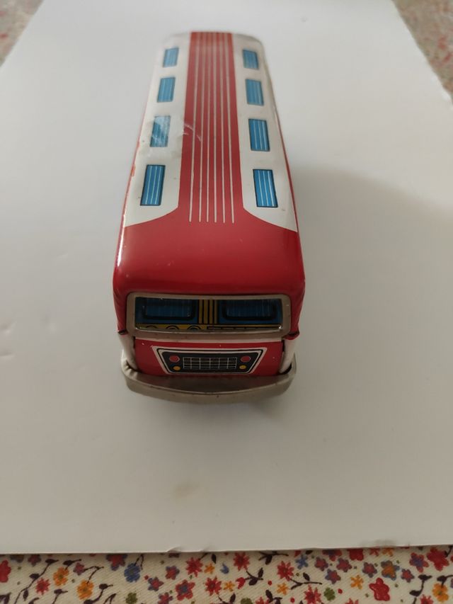 Juguete autobús hojalata