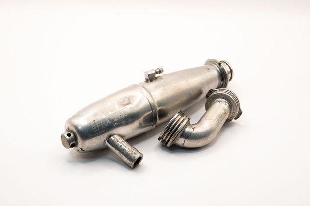 Escape y Codo One 1/8 Pista gas