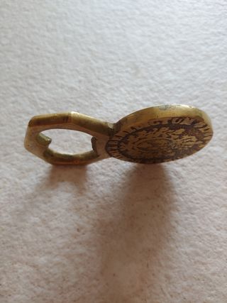 Apribottiglie moneta