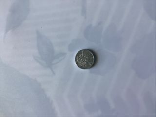 Colección de monedas de peseta antiguas.