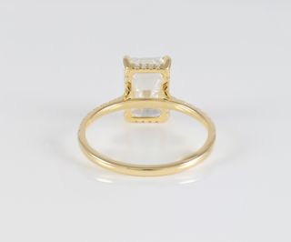Anillo de compromiso halo oculto oro amarillo 14k