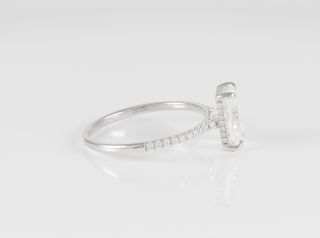 Anillo de compromiso halo oculto oro blanco 14k