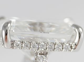 Anillo de compromiso halo oculto oro blanco 14k