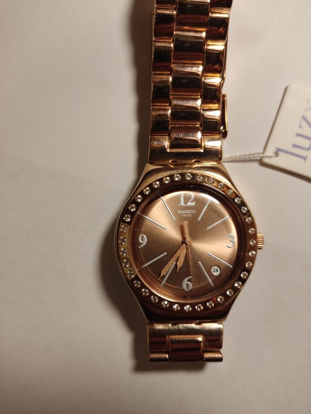 Reloj marca Swatch diámetro 36 mm.