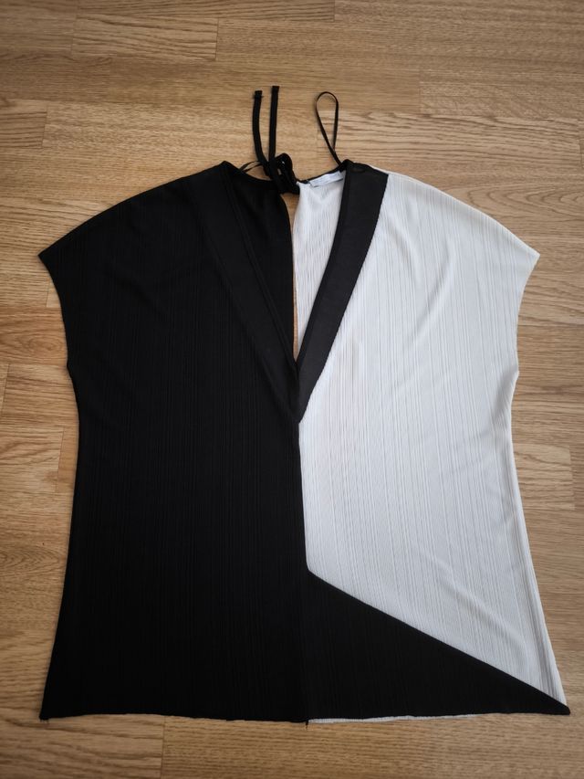 Camisa blanca y negra