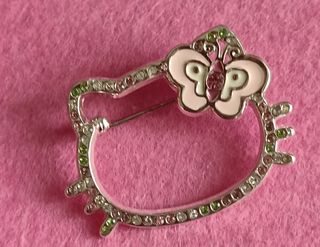 Parure anello e spilla