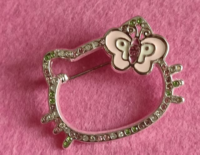 Parure anello e spilla