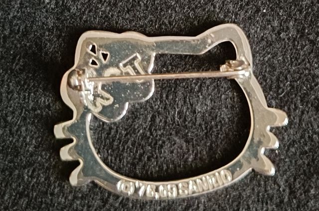 Parure anello e spilla