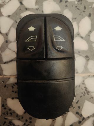 Mando de elevaluna de coche Ford escort.