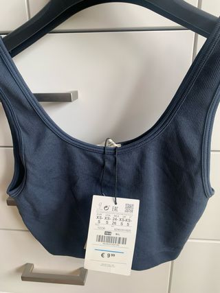 Top deporte azul marino etiquetas