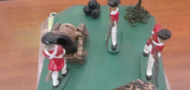 Escena de soldados de plomo con.bombarda