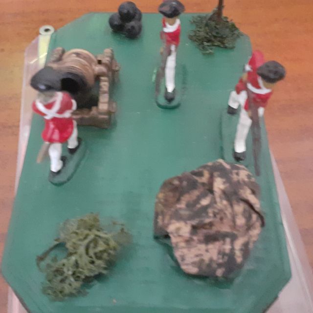 Escena de soldados de plomo con.bombarda