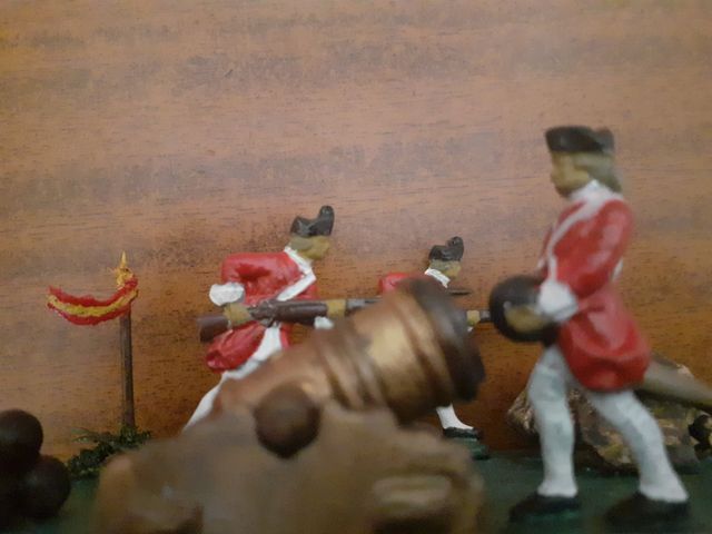 Escena de soldados de plomo con.bombarda