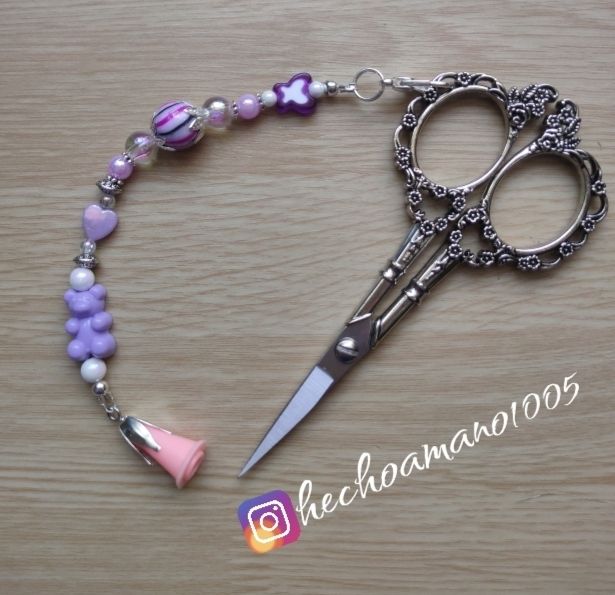 Buscatijeras osito lila