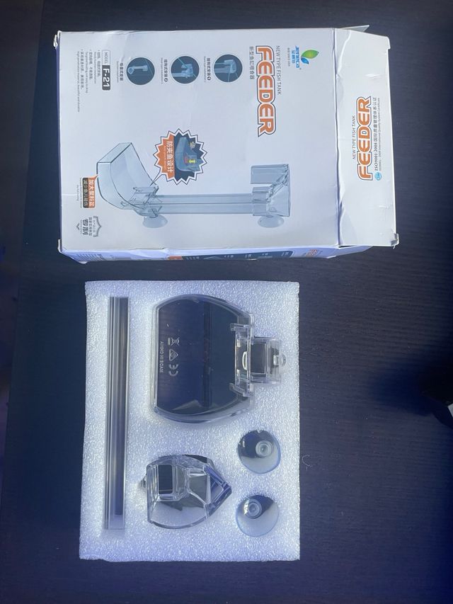 Alimentador peces de acuario