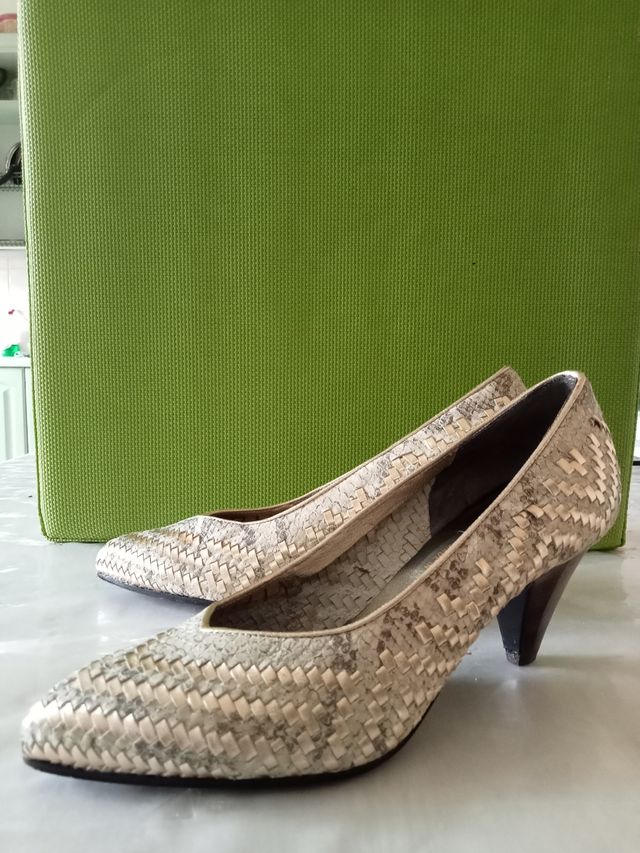 Décolleté pitone oro