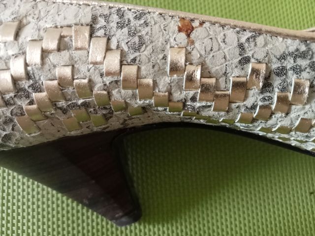 Décolleté pitone oro