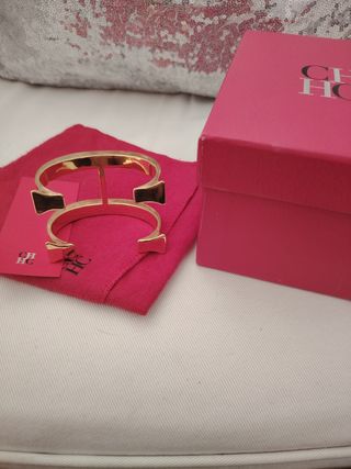Pulsera Carolina Herrera ,colección .Bañada  Oro 