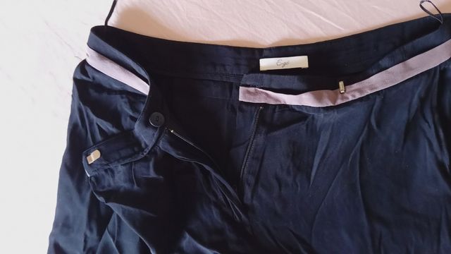 Pantaloni asimmetrici neri vita bassa