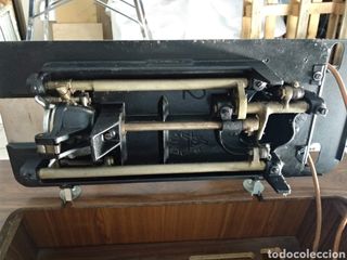 Maquina de coser marca Alfa