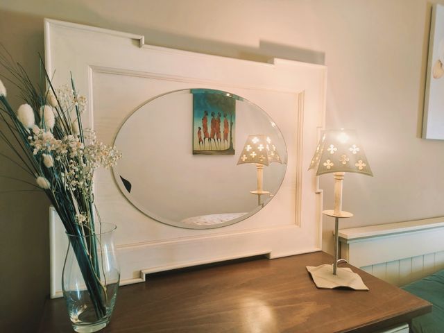 Espejo blanco original.