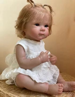 Bebe reborn niña de vinilo blandito