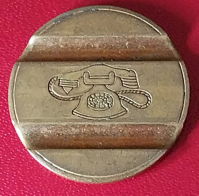 Gettone telefonico 7809