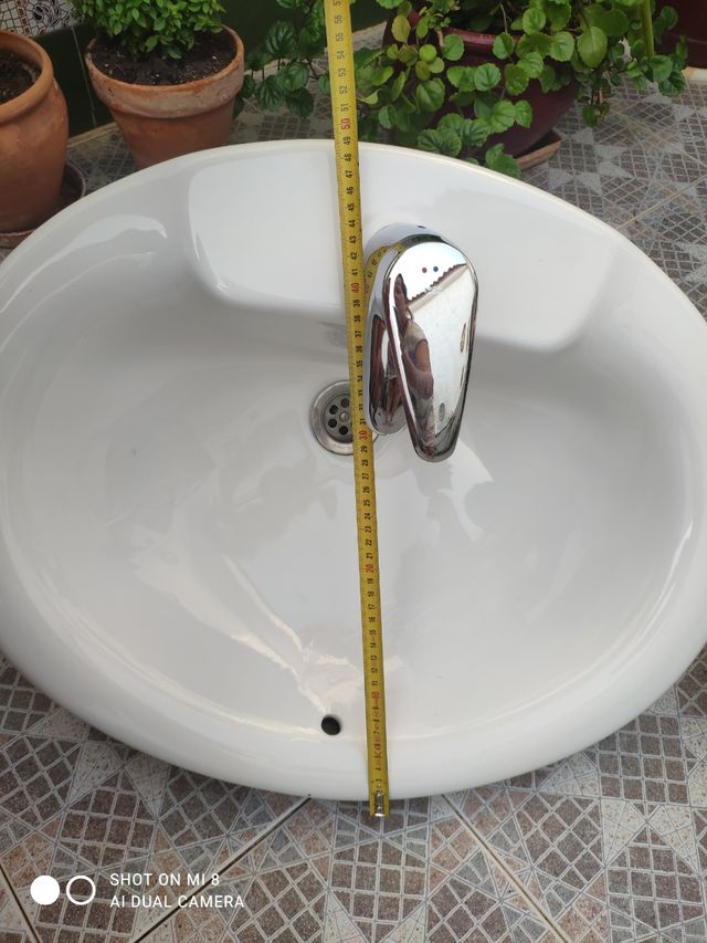 Lavabos con grifos Roca