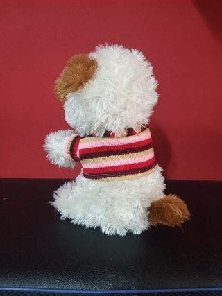 Peluche perro musical