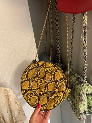 Bolso serpiente amarillo dorado