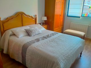 Dormitorio roble estilo clásico