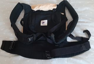 Mochila portabebes y reductor como nuevos