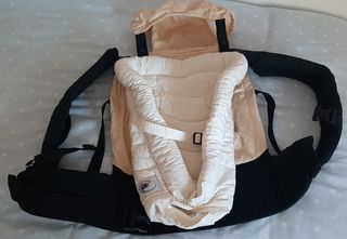 Mochila portabebes y reductor como nuevos