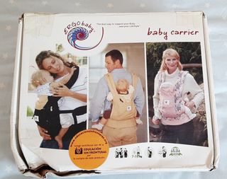 Mochila portabebes y reductor como nuevos