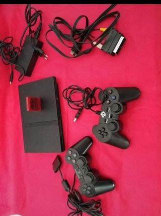 Playstation 2 + 2 controller + memory card