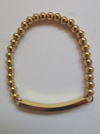 Pulsera Tommy Brazalete con cuentas. 