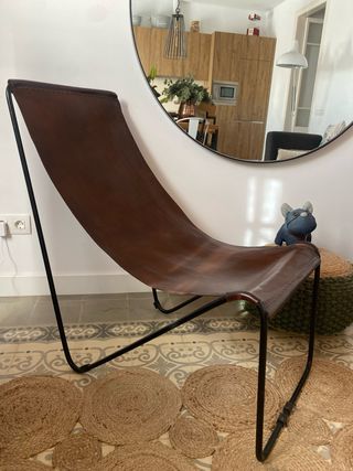 Poltrona in pelle marrone stile industriale