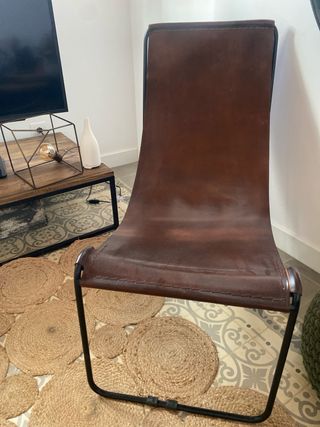 Poltrona in pelle marrone stile industriale