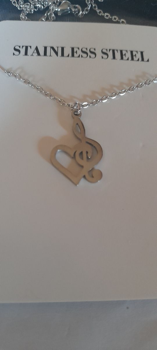 Colgante clave de sol corazon acero