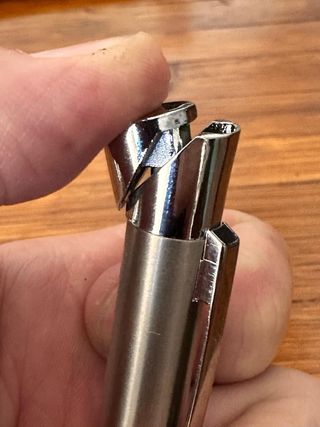 Bolígrafo encendedor plateado