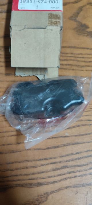 Tapa válvula escape Honda CR125R, 87-88