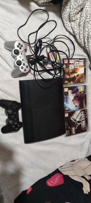 Play station 3 + 3 Juegos 