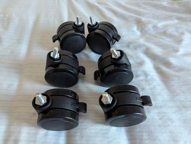 Next Level Racing Rodas bloqueáveis